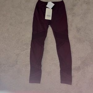 NWT ex small Fabletics! Color is plum purple
